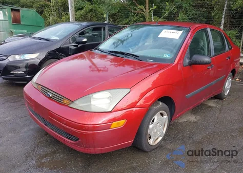 2004 Ford Focus Lx z USA, uszkodzony, nr VIN 1FAFP33PX4W121241